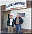 Guy and Doug in front of Aggie Lounge